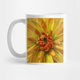 close-up glowing yellow and orange dahlia bloom Mug